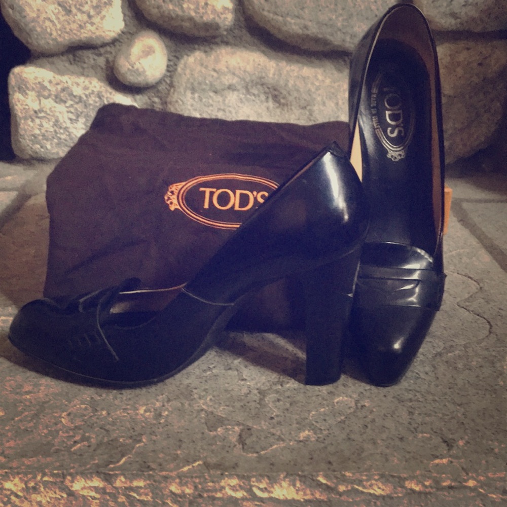 Tod’s Black Penny Loafers